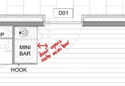 Floor plan detail showing bedroom door opening directly onto the mini bar area