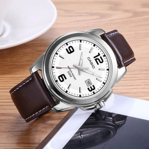 Casio – Montre homme – Bracelet cuir marron – Cadran blanc – MTP-1314L-7A Casio – Montre homme – Bracelet cuir marron – Cadran blanc – MTP-1314L-7A
