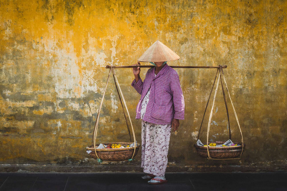 A Street Vendor in Hoi An, Vietnam