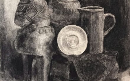 Child drawing in class at Art Tutor Hanoi