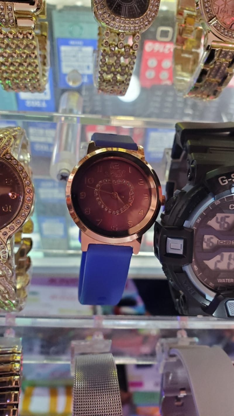 Ladies watch small , blue belt , gold color watch