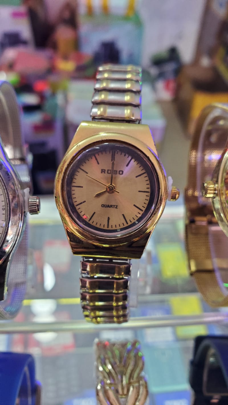 Robo Quartz  Watch all gold and silver color , elastic belt 