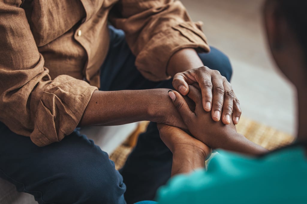 Intergenerational connection - hands of young and old