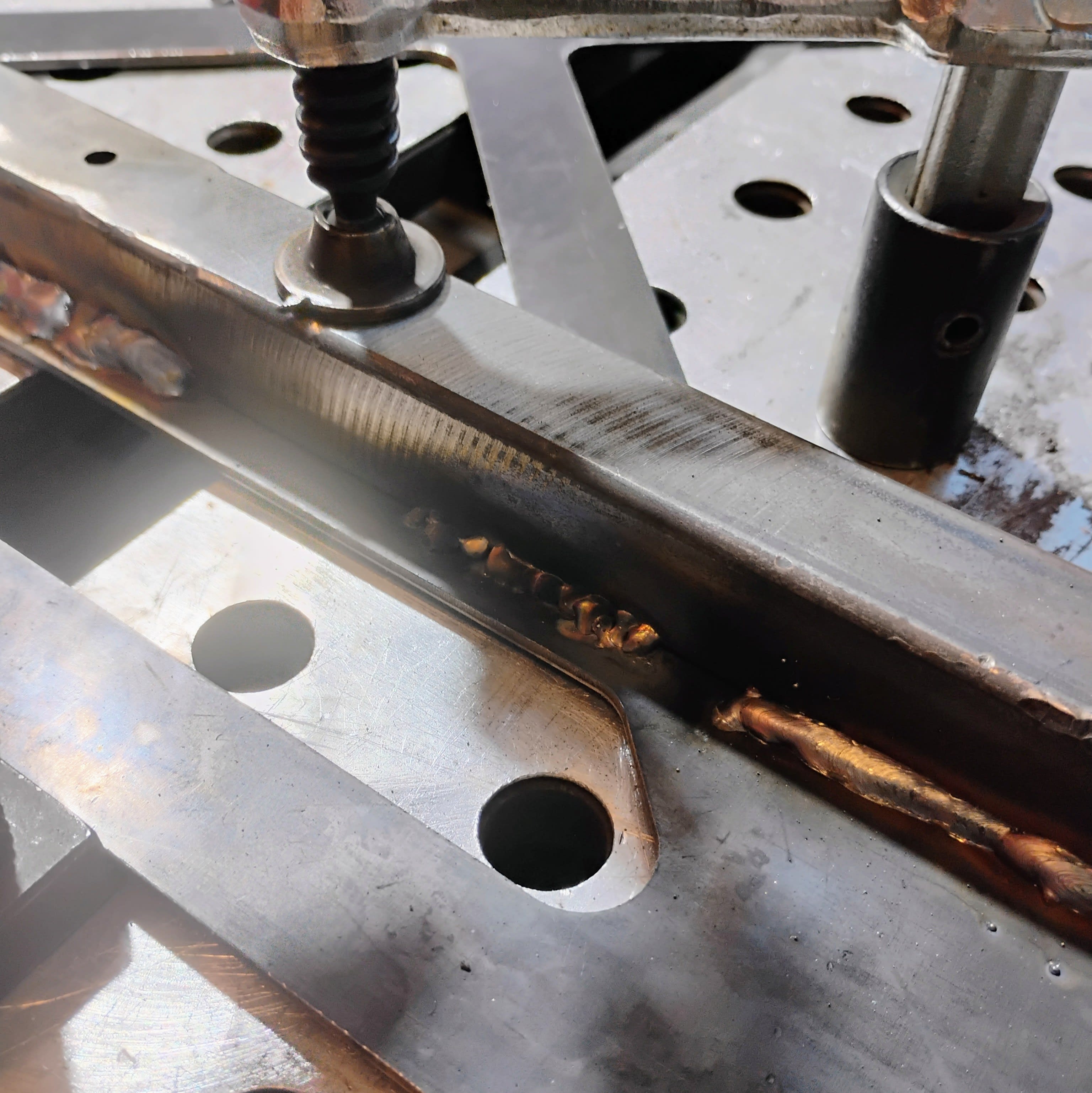 My sad weld next to Anhad's TIG welds