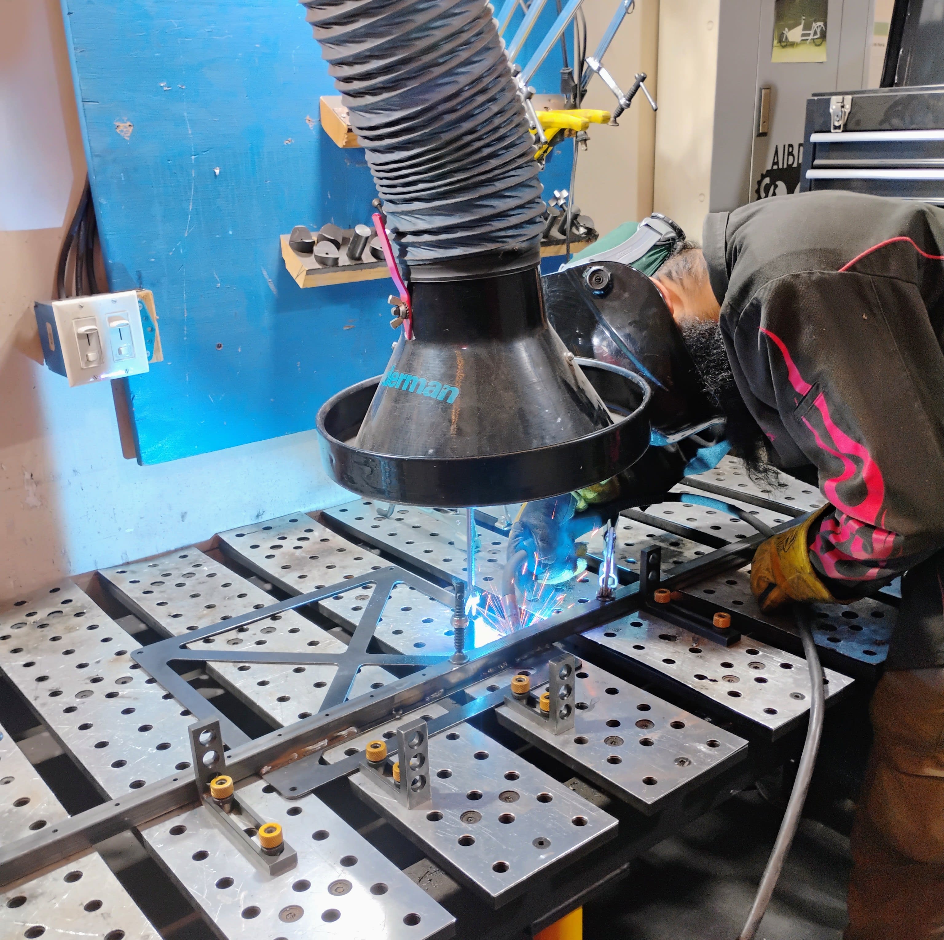 Anhad TIG welding the tube to the plate