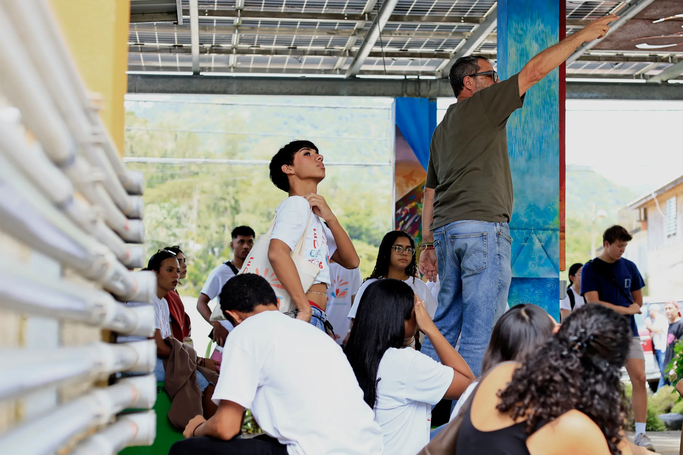 Adjuntas, Puerto Rico, 06/24/2026. Arturo Massol Deyá, director of the organization Casa Pueblo, shows students from the University of Puerto Rico how solar microgrids function and how they connect to one another through the Microgrid Orchestrator. | Thais Llorca for The Parlor Magazine