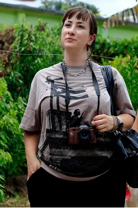Adjuntas, Puerto Rico, 06/24/2026. Andrea Méndez, professor at the University of Massachusetts (UMass), speaks with Arturo Massol | Thais Llorca for The Parlor Magazine