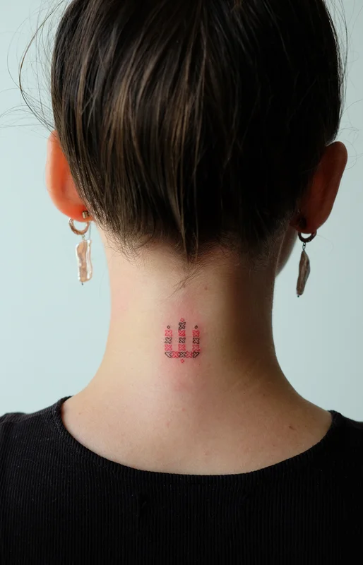 coat of arms of Ukraine tattoo in the style of embroidery