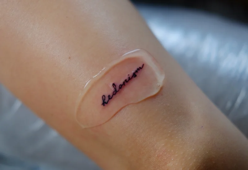 Inscription tattoo Hedonism