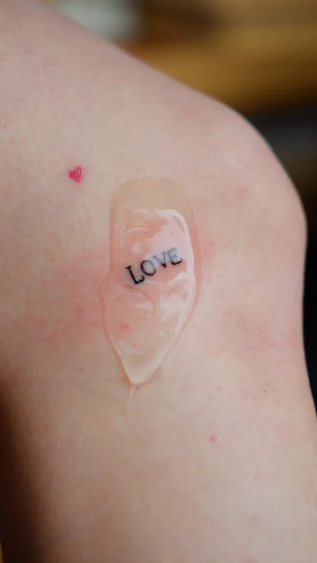 Inscription tattoo Love