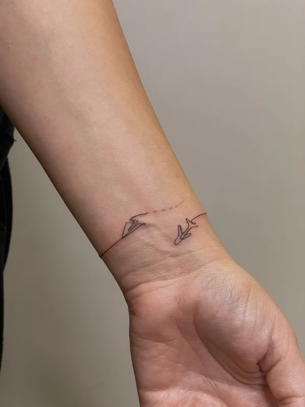 mini tattoo bracelet with airplanes