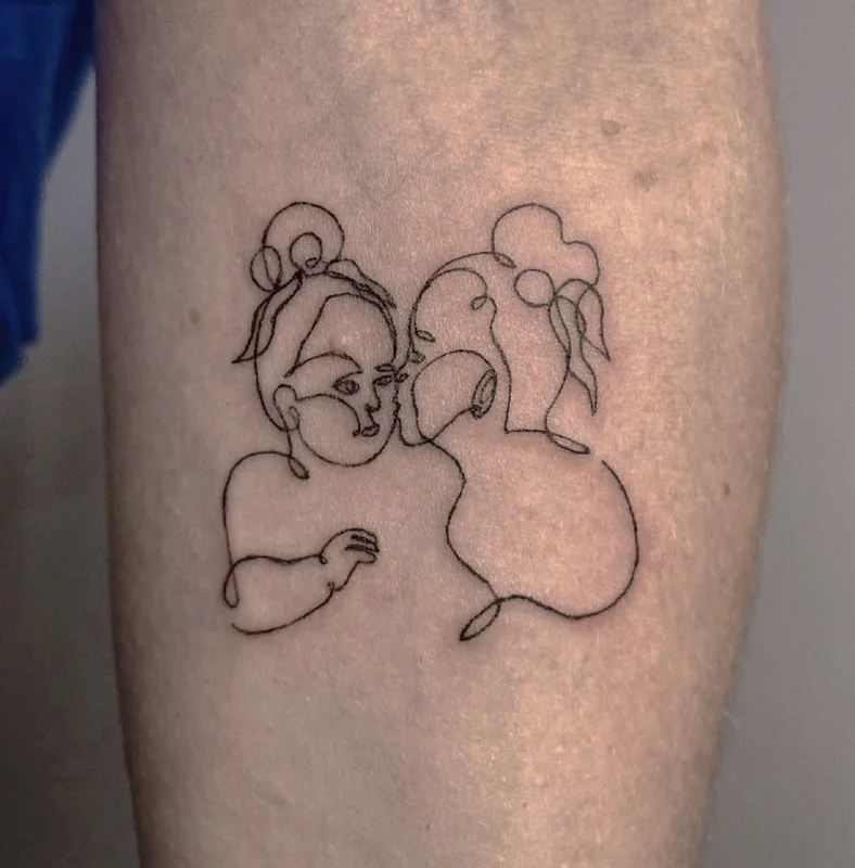 Single line of a portrait of children tattoo