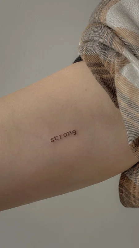tattoo inscription on biceps