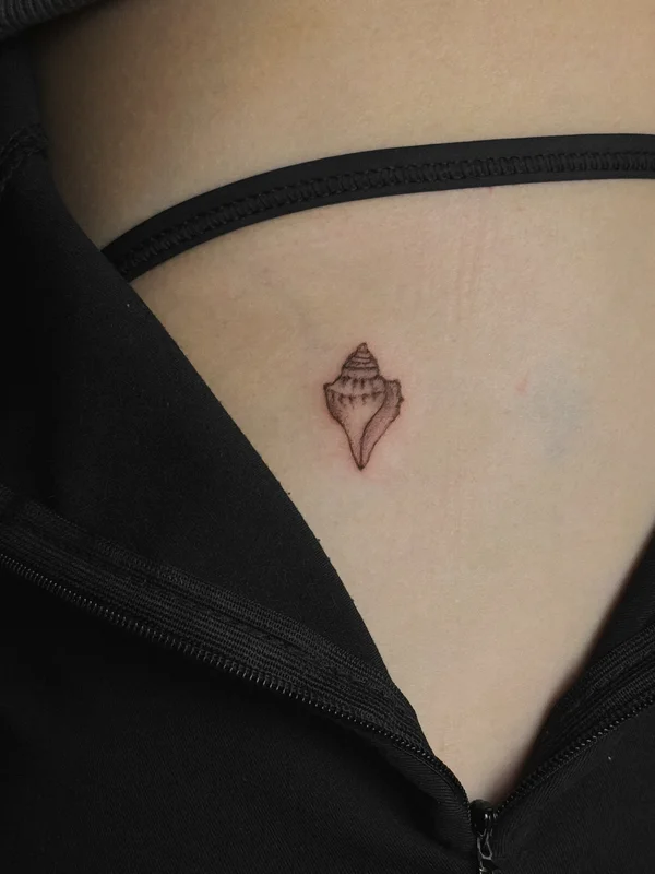 shell mini tattoo