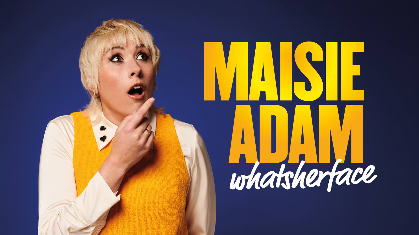 Promotional image of the same surprised pose beside bold yellow text reading 'MAISIE ADAM' with 'whatsherface' in white handwritten-style lettering on a blue background.