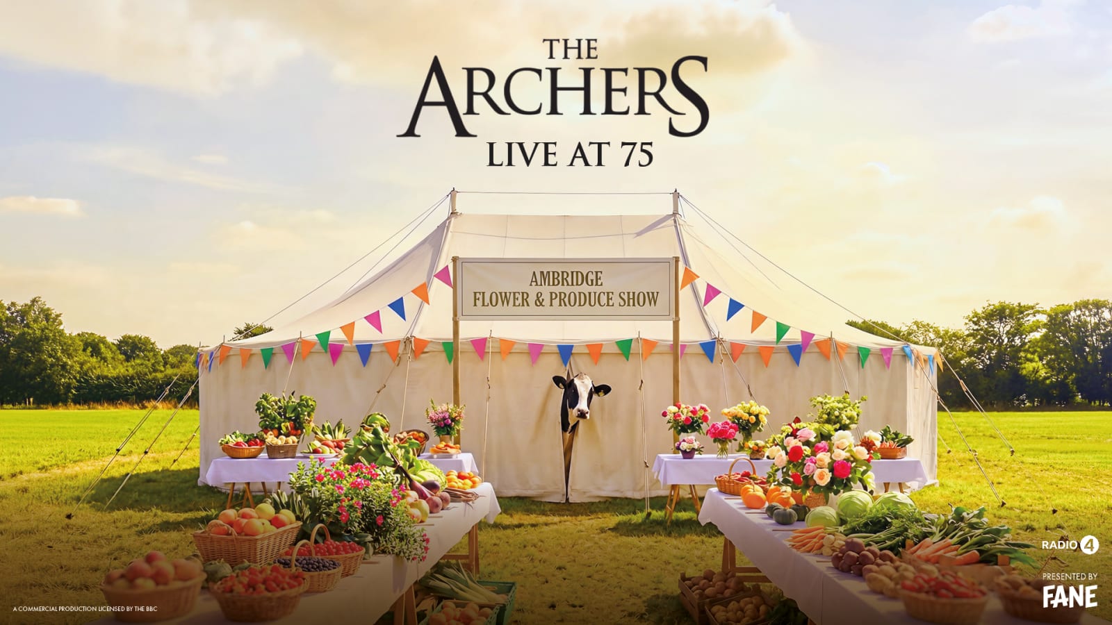 Promotional artwork for The Archers Live at 75 with bold title text above a cream marquee, bunting, produce-laden tables, a cow at the entrance and Radio 4 and Fane logos.