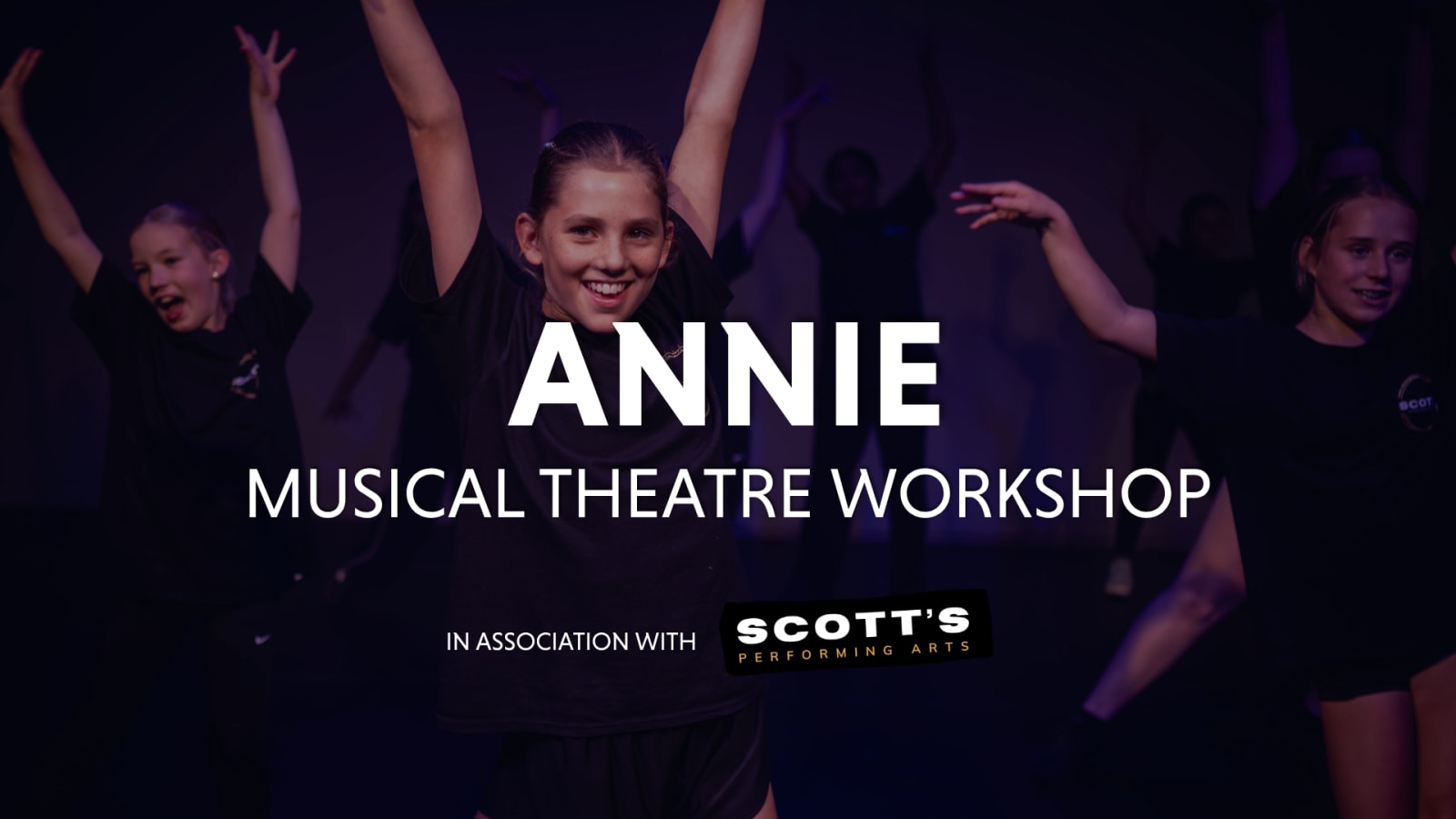 Promotional graphic reading 'ANNIE Musical Theatre Workshop in association with Scott's Performing Arts' with young performers in black T-shirts dancing against a blue-purple background.