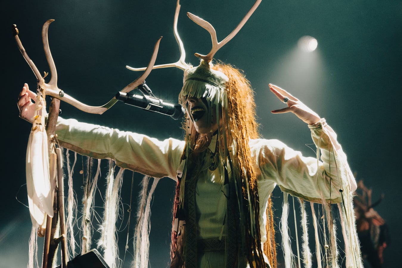 person on stage performing