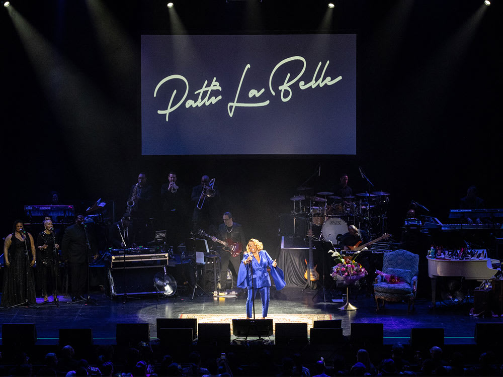 A crowd shot of Patti LaBelle performing on stage at Kings Theatre.