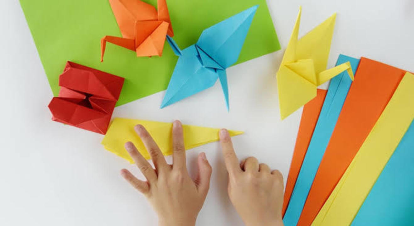 Between the Folds : An Origami Story