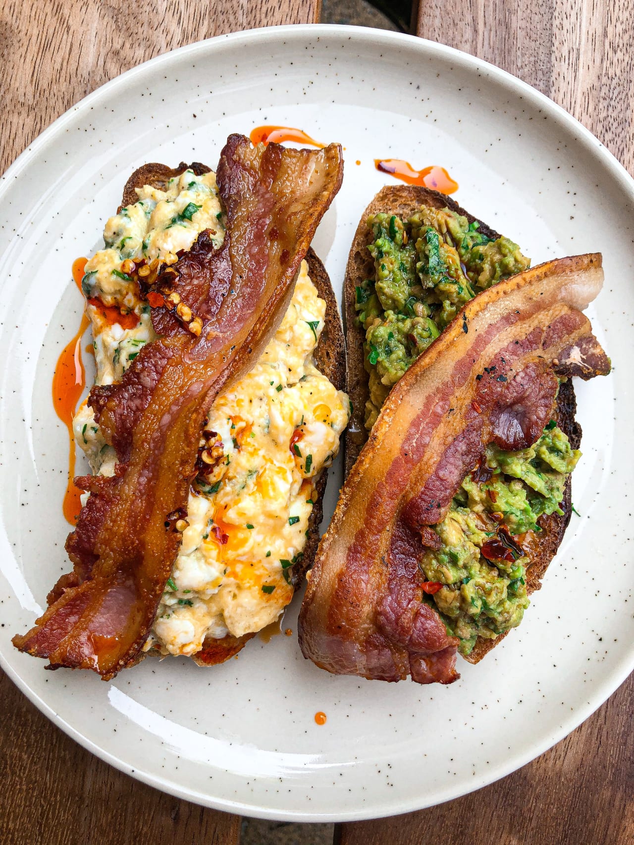 Smoked streaky bacon, Guacamole, Scrambled eggs on Sourdough.