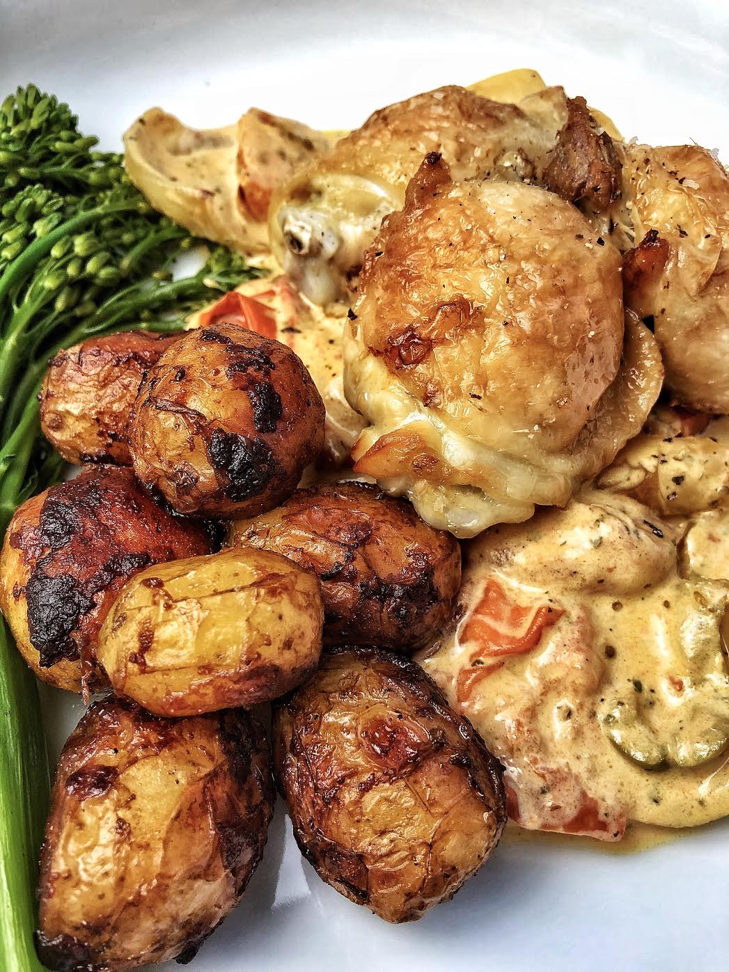 Roasted Chicken Thighs with a Creamy Roasted Vegetable Sauce & Chicken Fat Potatoes