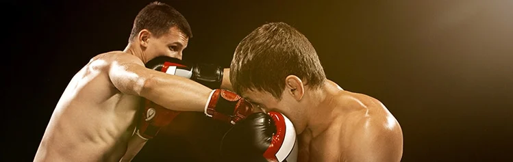 Two professional boxer boxing on black background,