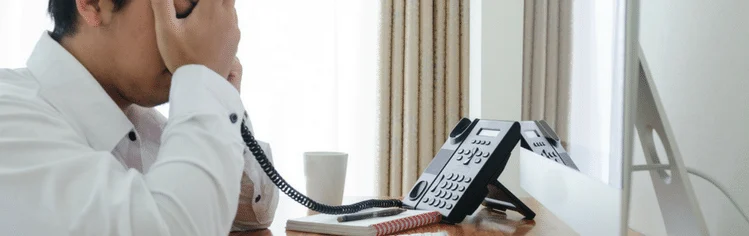 managed servers customer sitting in front of a computer