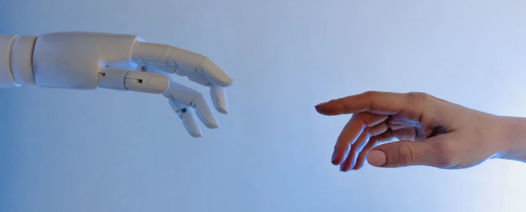 AI hand and human hand reaching to touch
