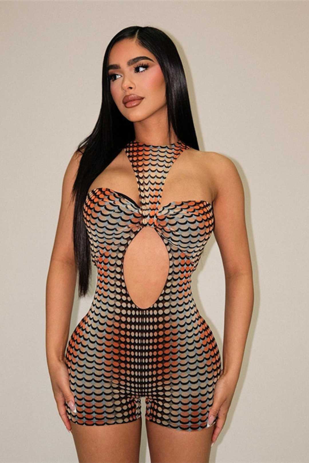 Sexy Hollow Printed Tight Hip Jumpsuit