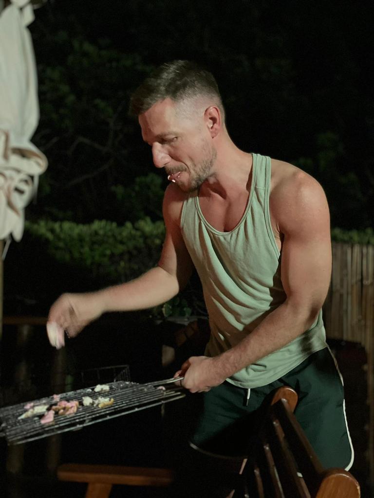 Fabio trying to roast marshmellows in a braai