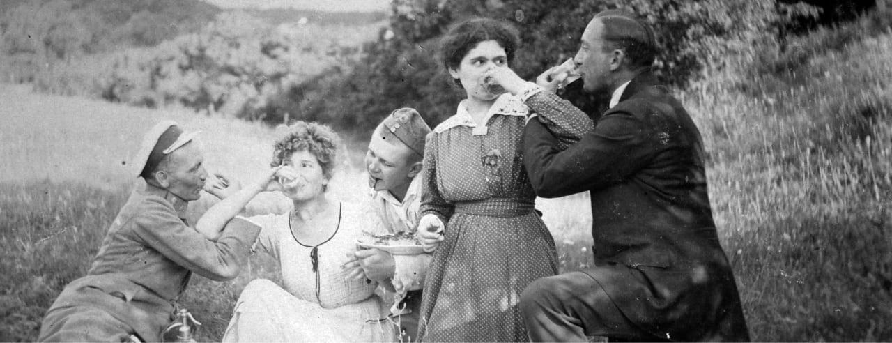 People drinking palinka in 19th century Hungary