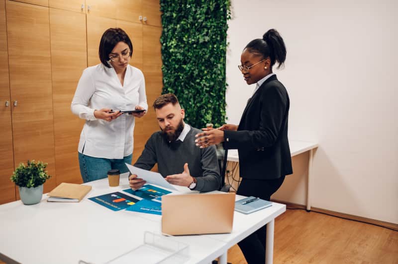 Multicultural team working together