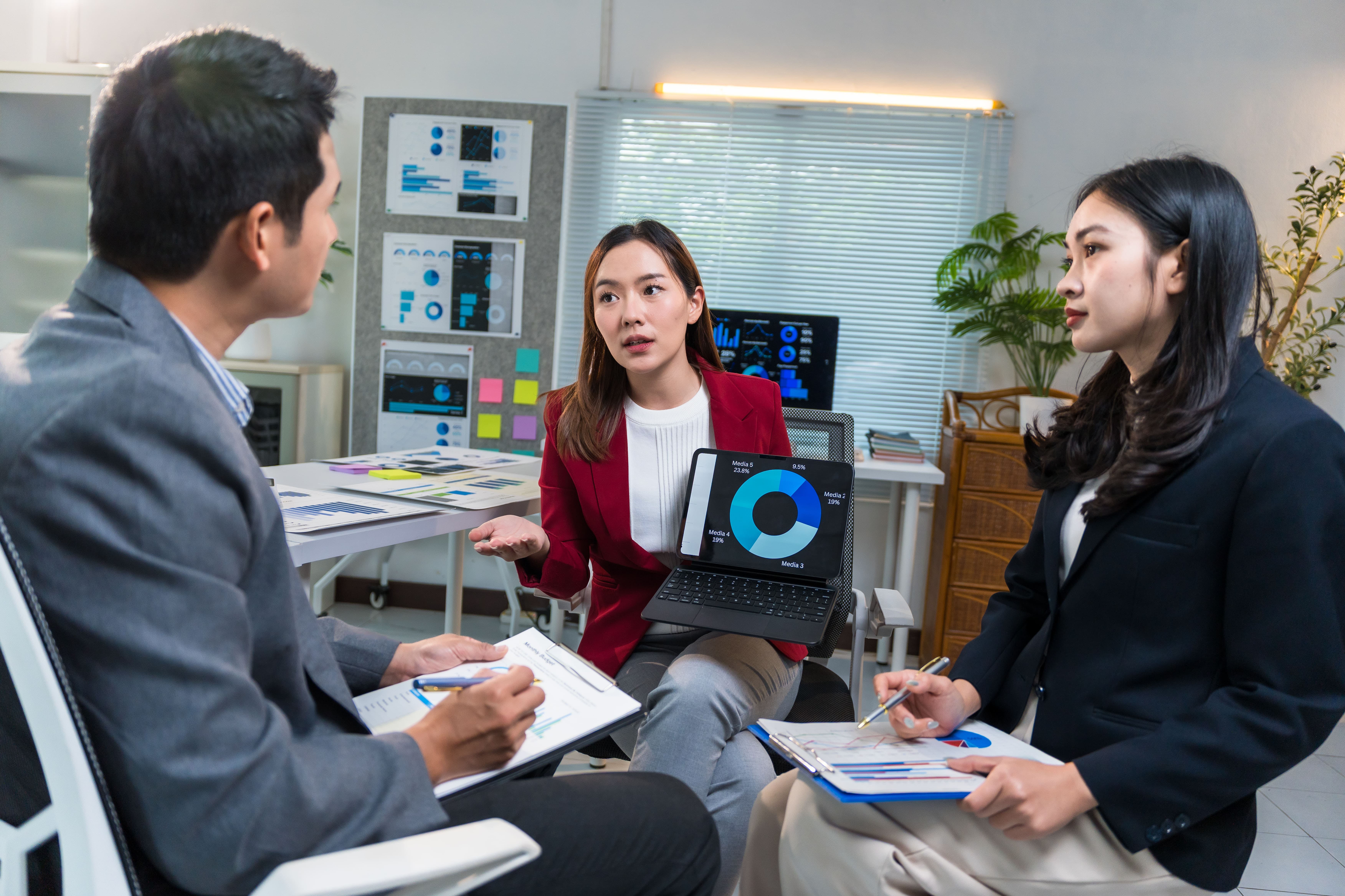 Business team analyzing financial charts