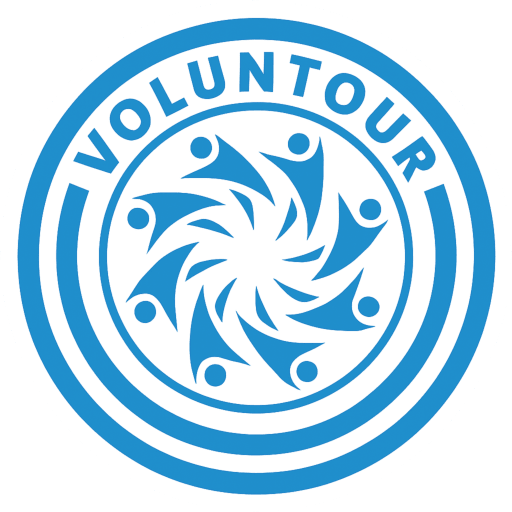 Voluntour - Travel with Purpose logo