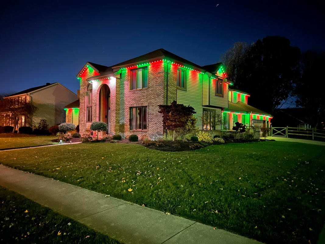 Trimlight decorated house