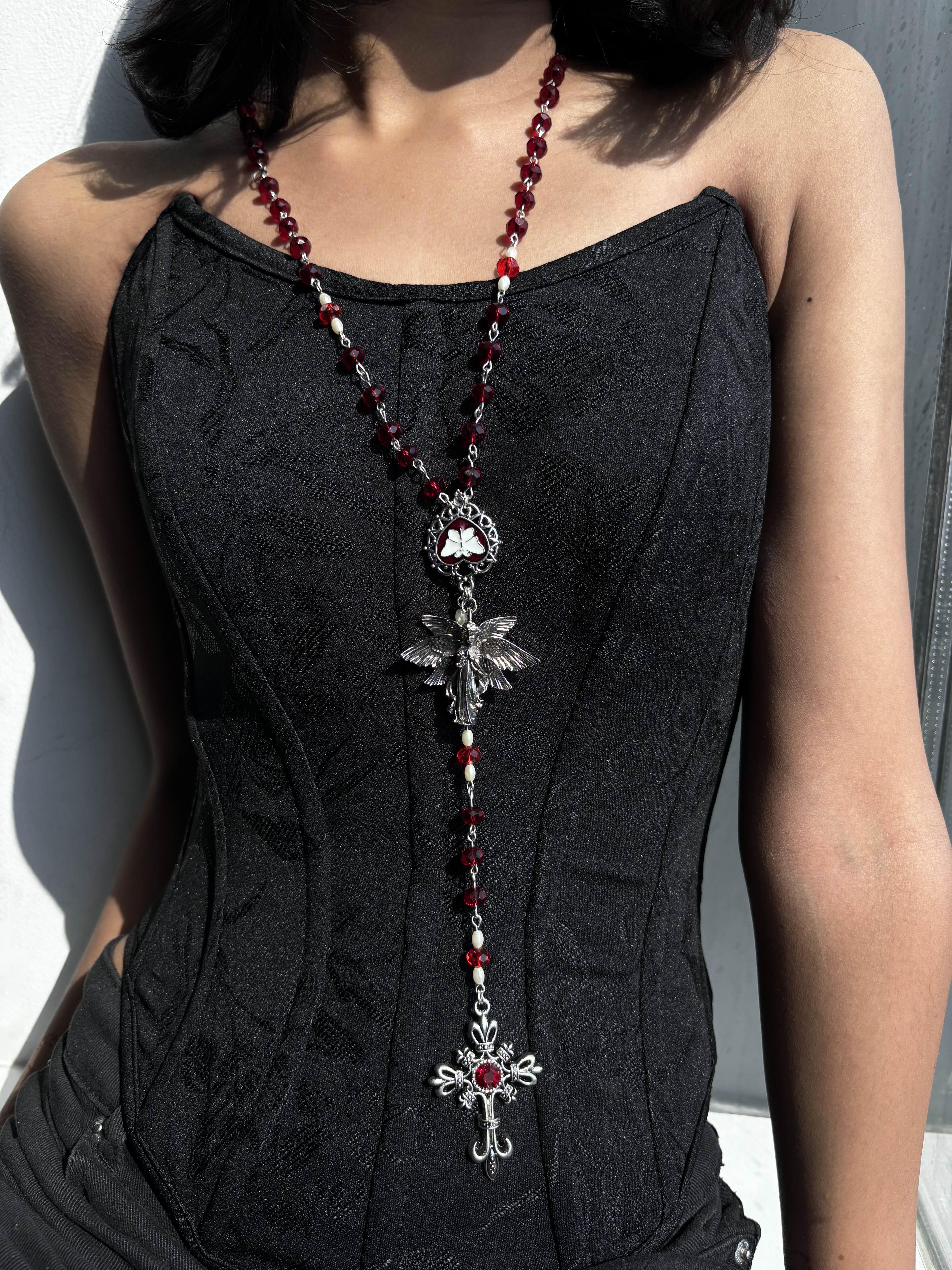 Customer wearing Burial Standard jewellery