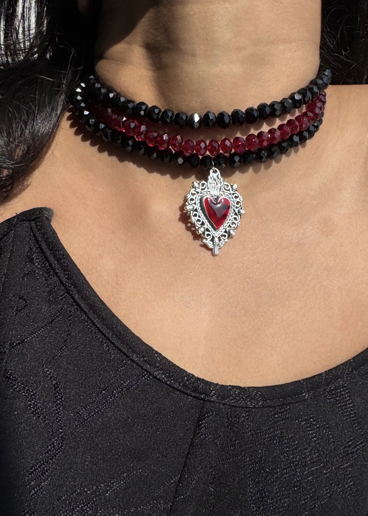 Customer wearing Burial Standard jewellery