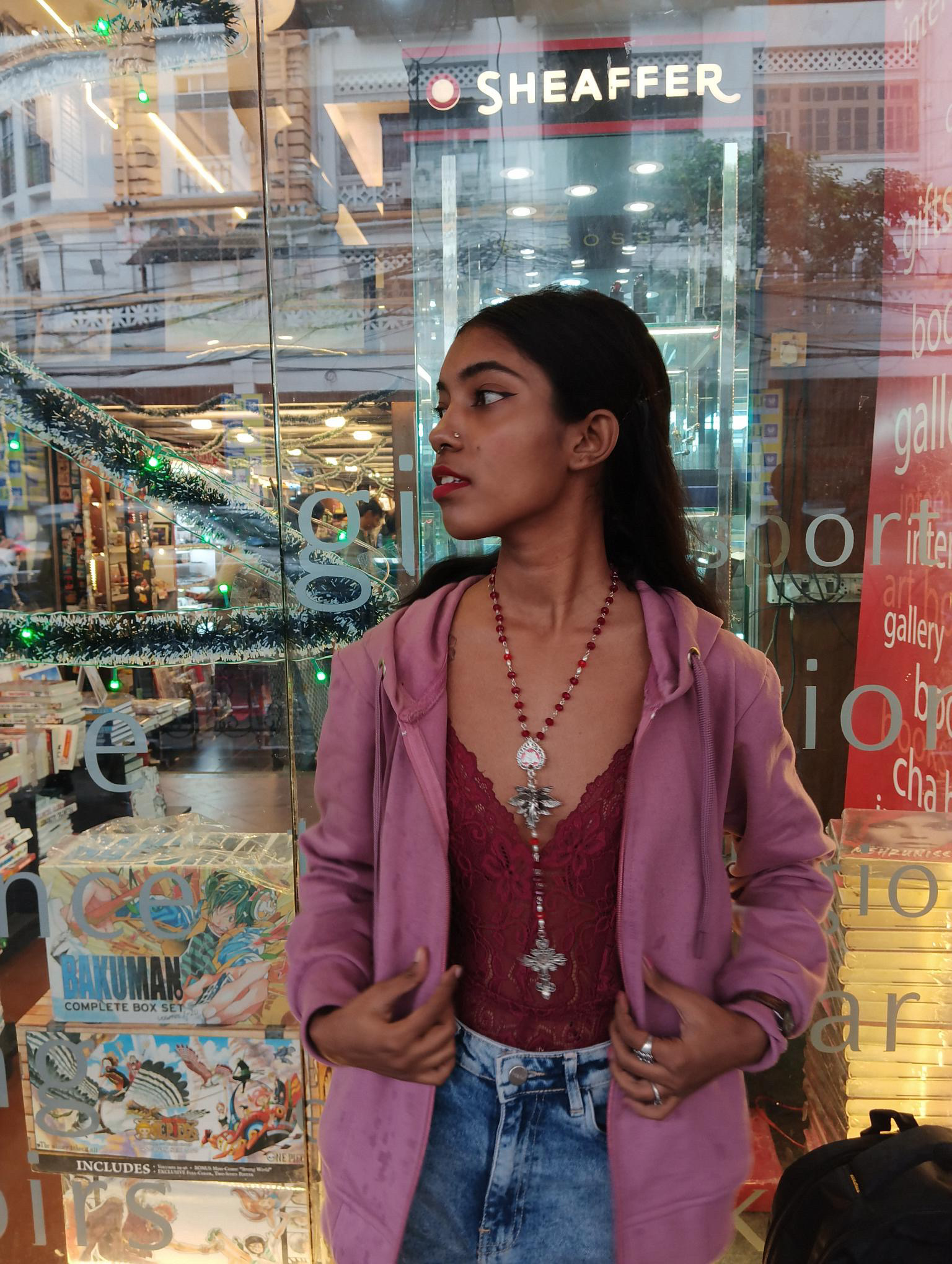 Customer wearing Burial Standard jewellery