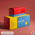 Two colorful rectangular boxes with red and blue surfaces on a brown background.