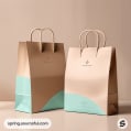 Beige and aqua paper bags with curved design and handles.