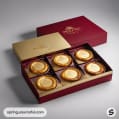 Box of six large pies in a red and gold presentation box.