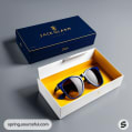 Navy and white box with sunglasses, box open to show yellow interior.