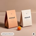 Peach and white triangular paper bags with apricot.