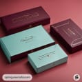 Rectangular boxes in teal and burgundy with geometric designs.