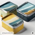 Square tins with oceanic and landscape designs in blue, green, and yellow shades.