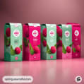 Four mint boxes with raspberry designs, varying in green and pink shades against a pink backdrop.