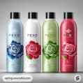 Four shampoo bottles with embossed roses in different colors.