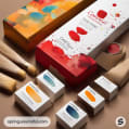 Vibrant paint-themed packaging with brushes on neutral surface.