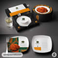 Sophisticated dining set with boxed packaging and vibrantly plated food.